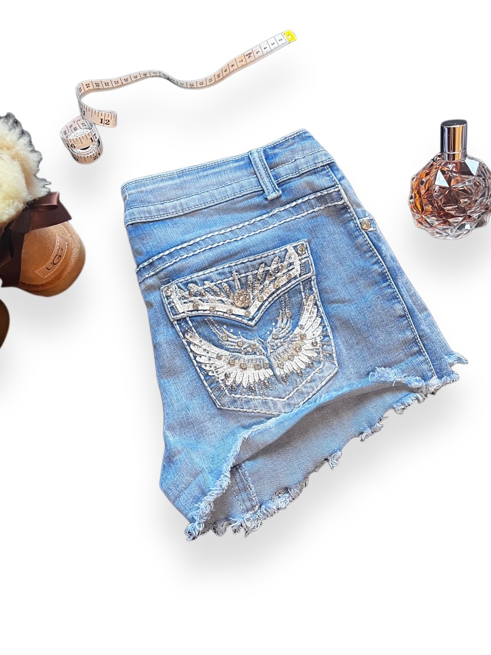 Women's Light Blue Distressed Denim Shorts with Embroidered Pocket -